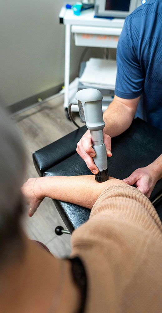 Stoßwellentherapie am Unterarm